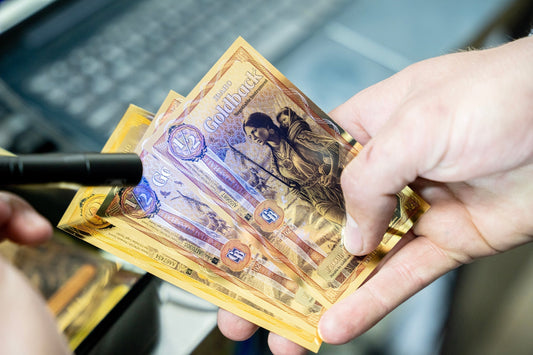 Idaho Goldback notes in a lifestyle setting