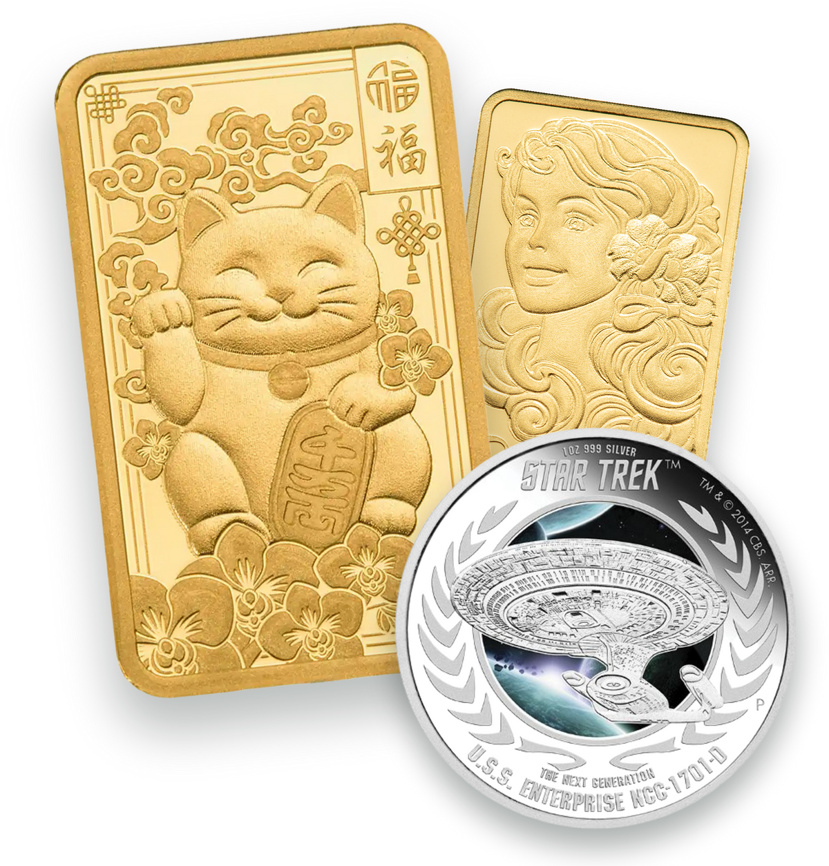 PAMP Lucky Cat gold bar and a portrait gold bar beside a Star Trek proof silver coin